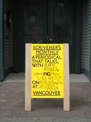 A yellow sandwich board positioned in front of the entrance of Western Front that reads Scrivener's Monthly a periodical that talks with Robert Ashley, speaking thru Will Holder on 14, 15, 16 June, 8pm at Western Front Vancouver in black capital letters. 
